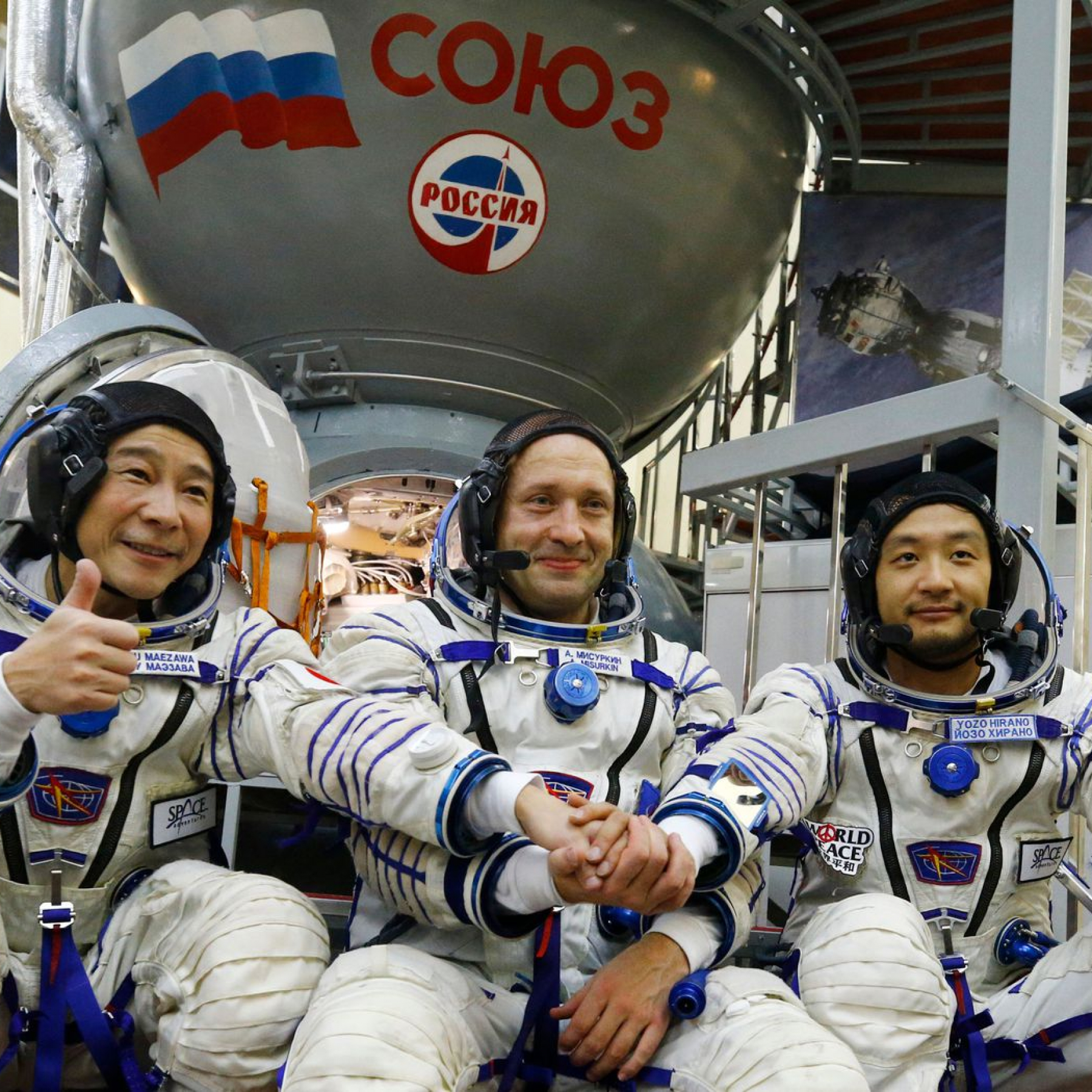 Japanese space tourists safely return to Earth