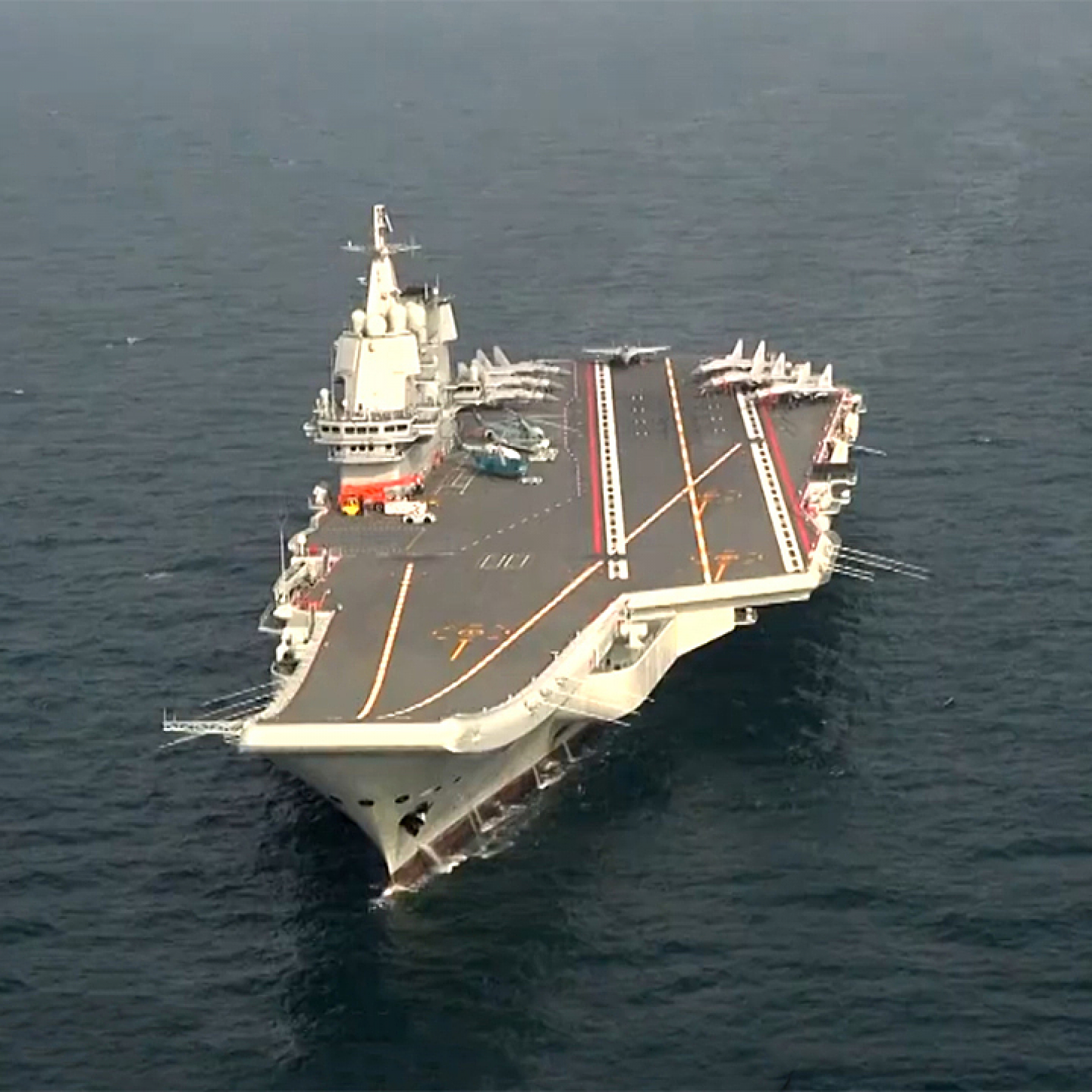 Chinese carrier warships sails through waters near Okinawa says Japan