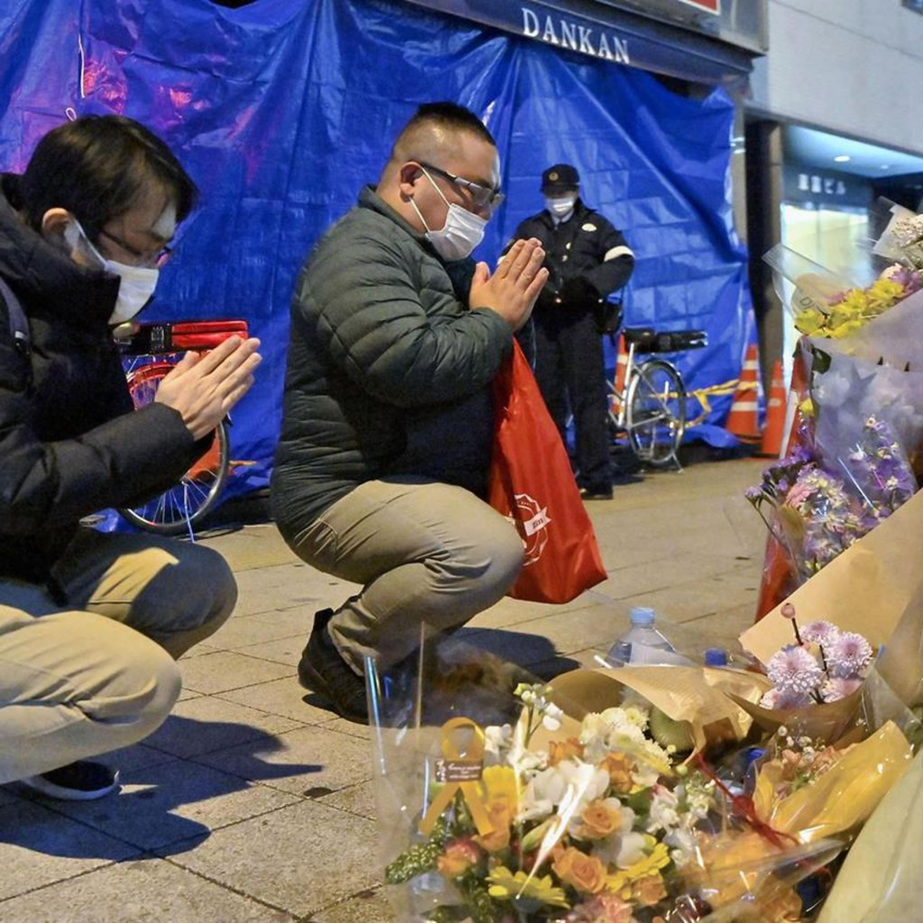 Japans emperor prays for pandemic dead in New Year message