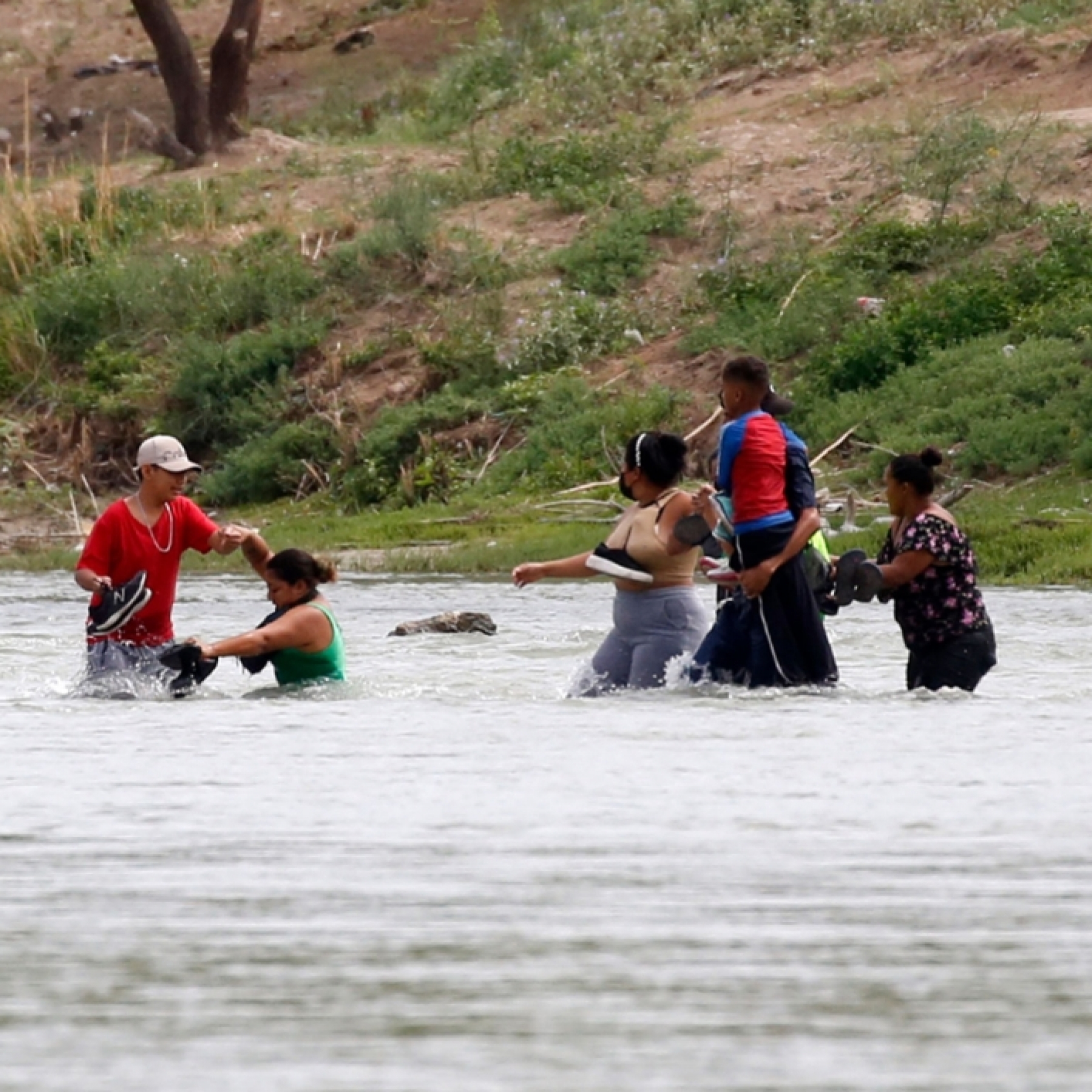 migrant crossing the Rio Bravo river from Mexico last week