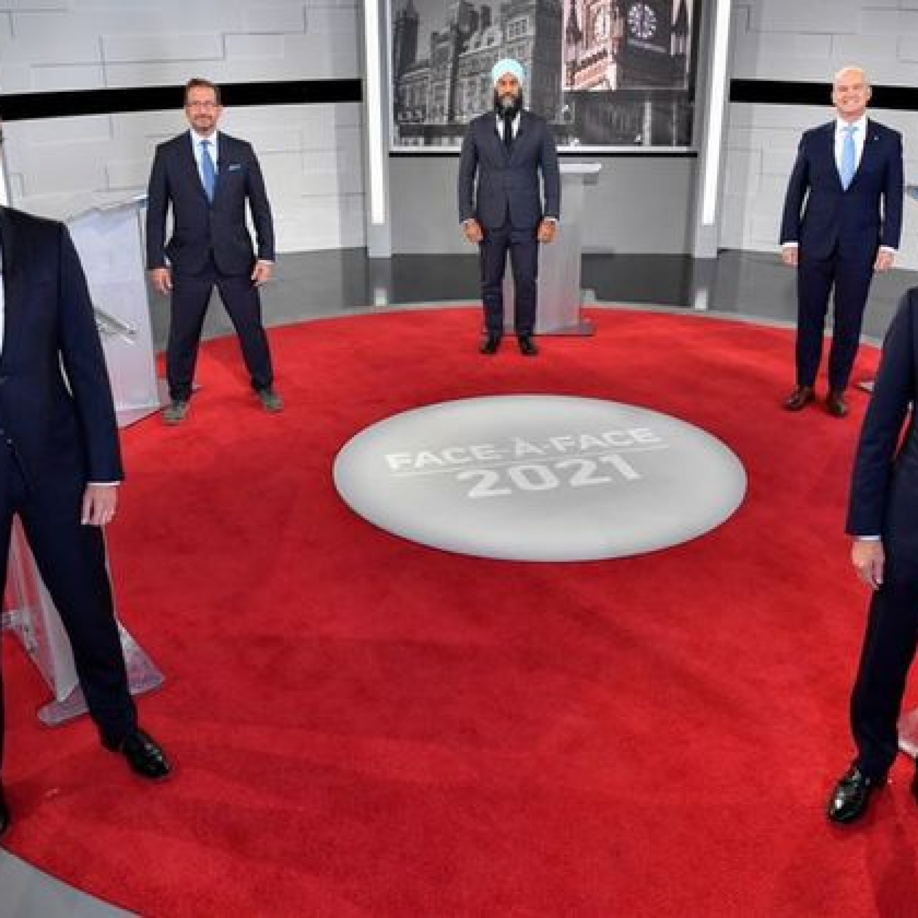 Federal leaders face off over COVID-19 and vaccinations in first election debate