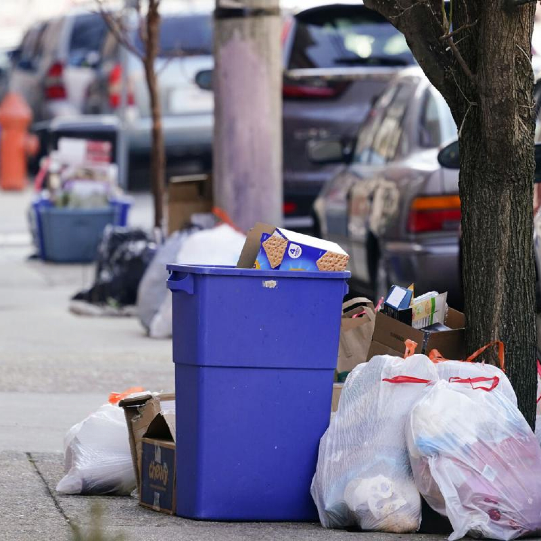 Garbage and recyclables pile up as omicron takes its toll