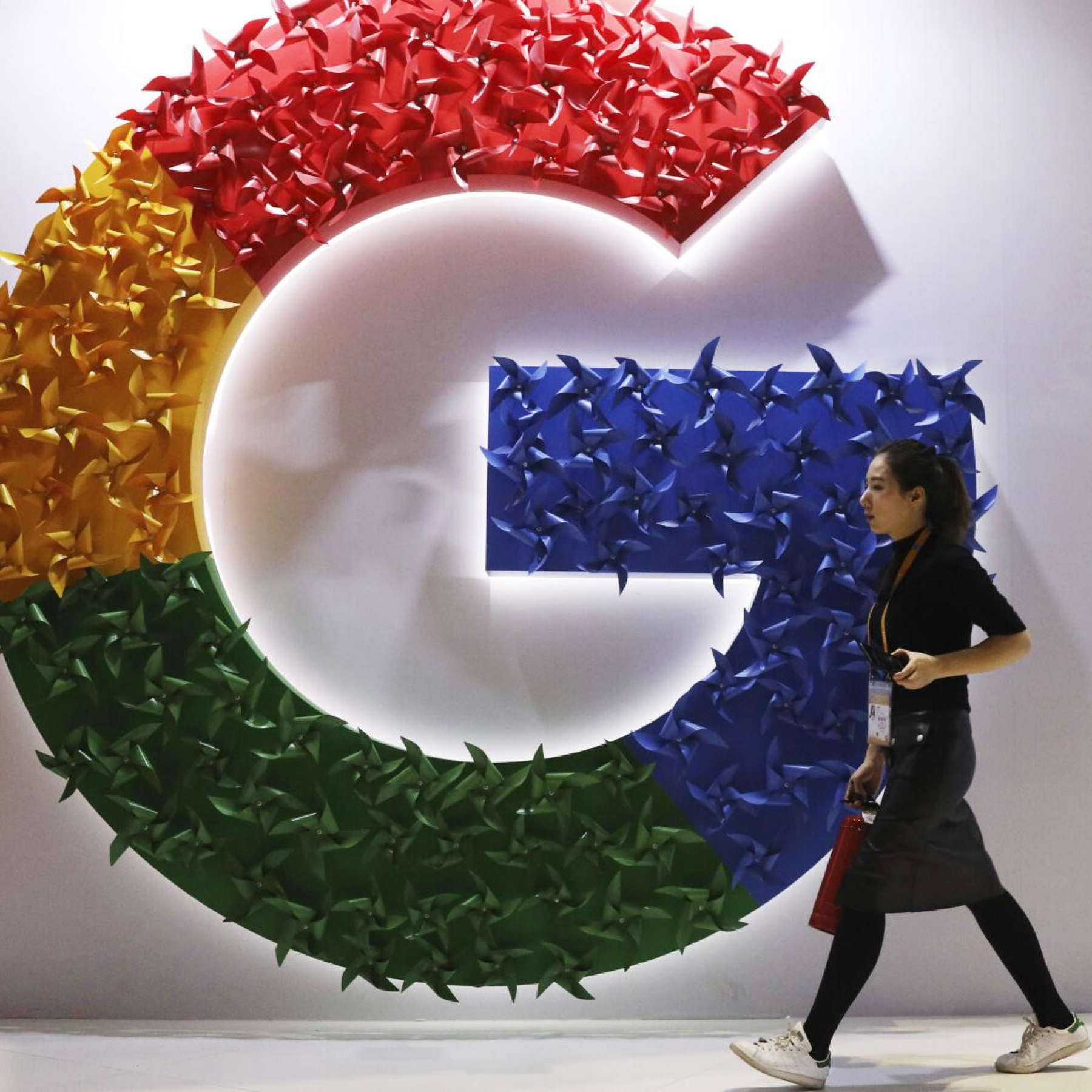 Googles Q4 ad sales soar again parent plans to split stock