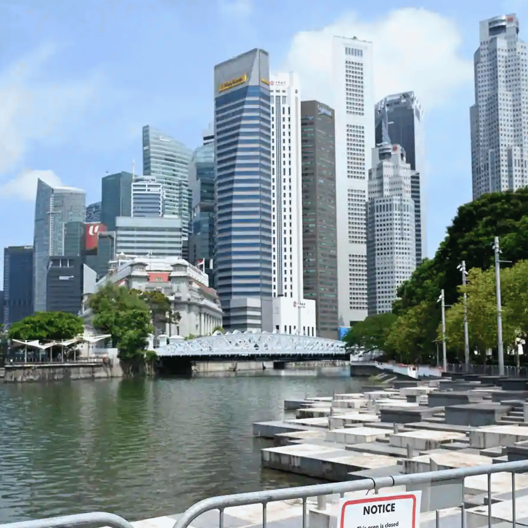 Singapore looks to ease coronavirus restrictions on migrant laborers after confining them for over a year