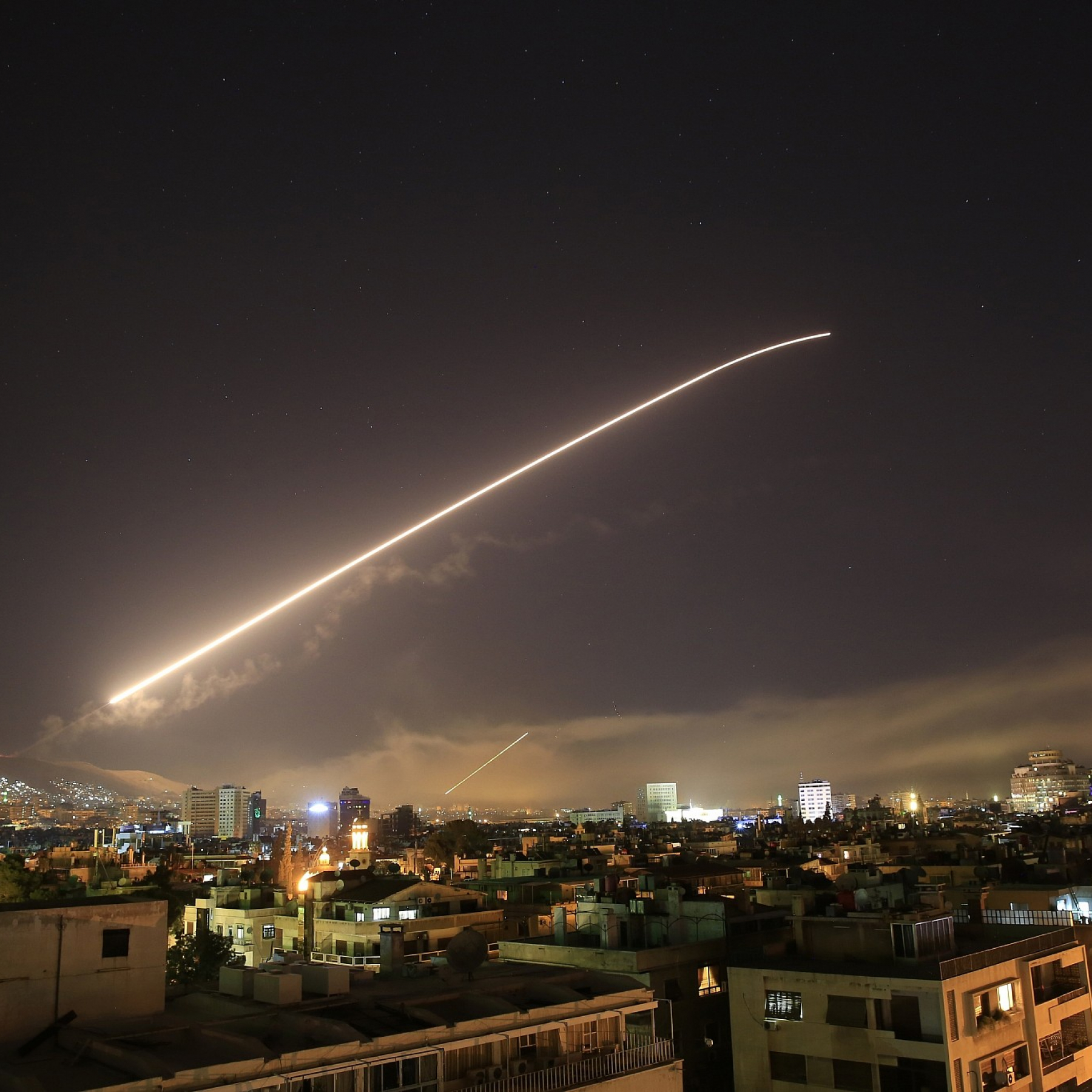 Syria says Israel attacked areas near the capital Damascus