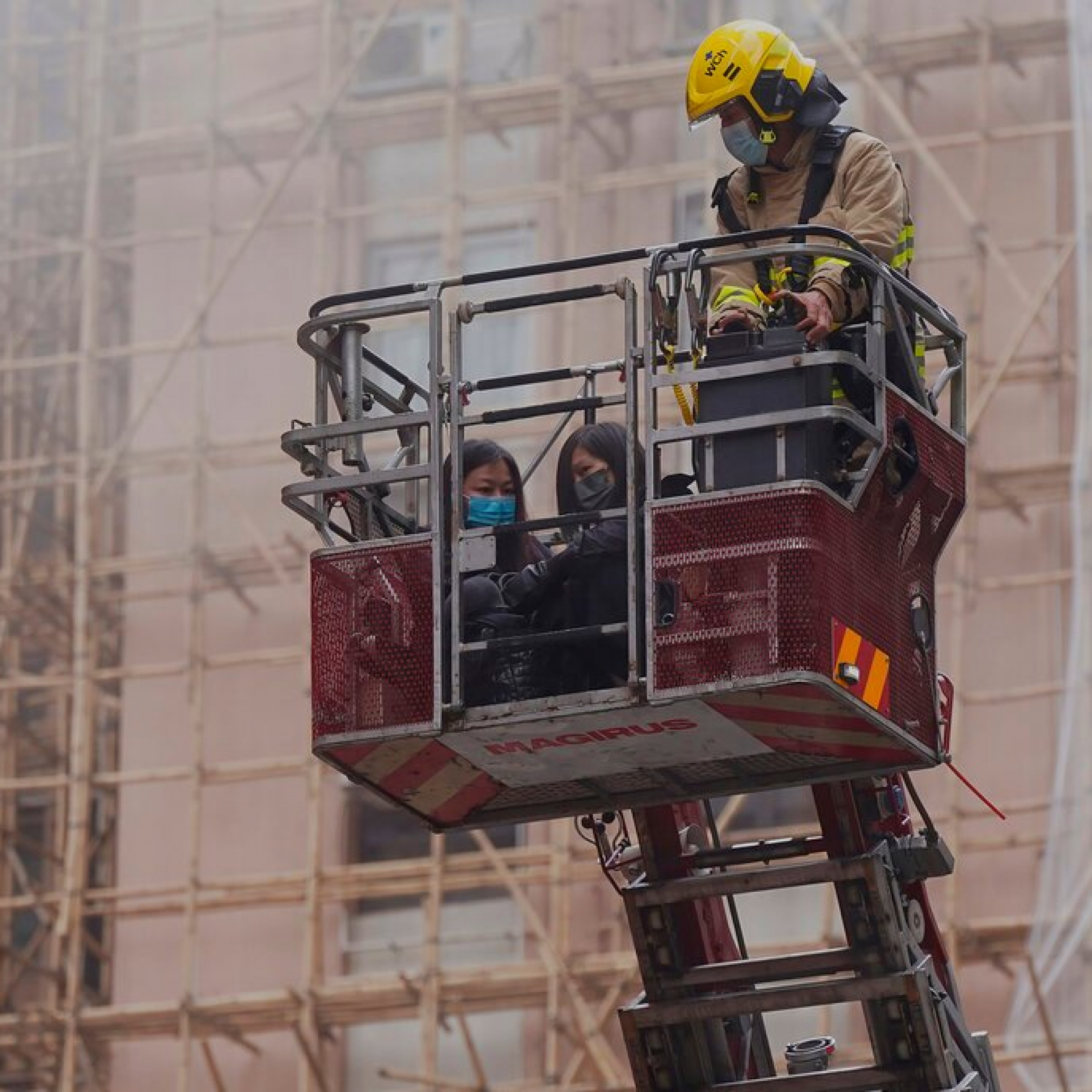 Hong Kong fire traps 150 people on roof of 39-storey World Trade Centre
