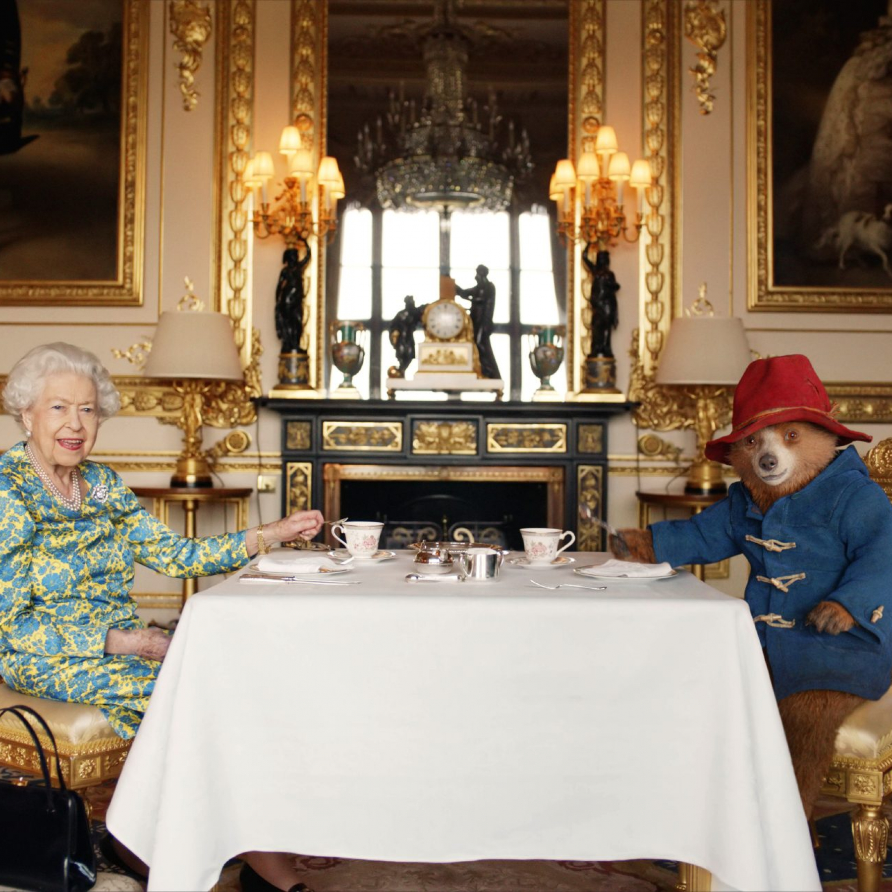 Paddington Bear joins Queen Elizabeth II for tea at Buckingham Palace