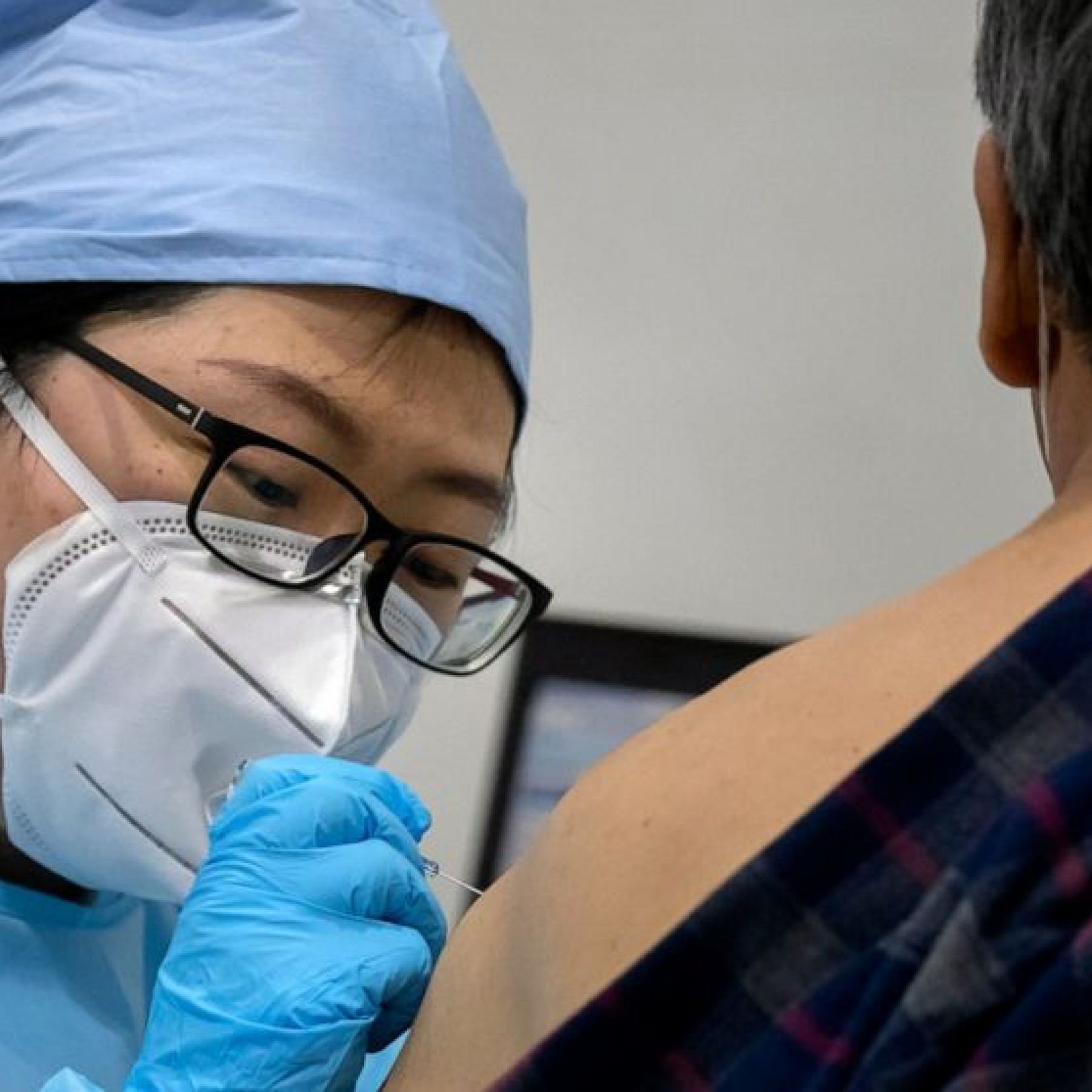 Beijing appears to retract vaccine mandate after pushback from residents
