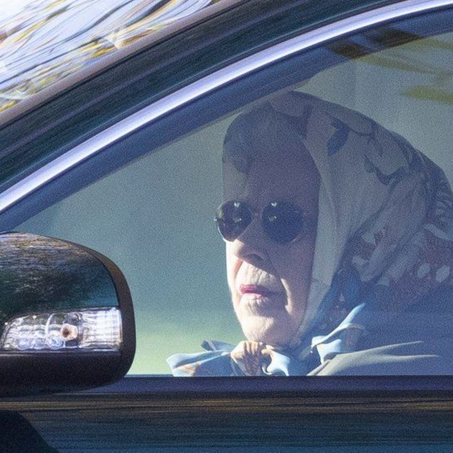 The Queen spotted driving car on Windsor estate