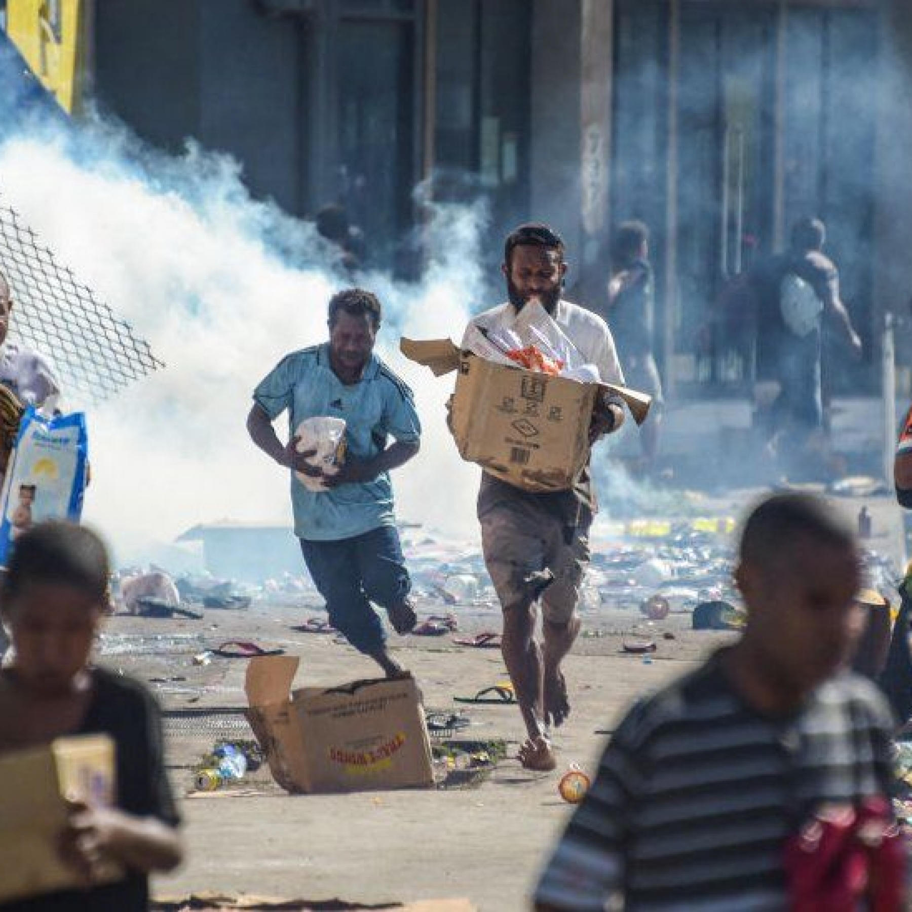 Shops and cars were set on fire and supermarkets looted across the city