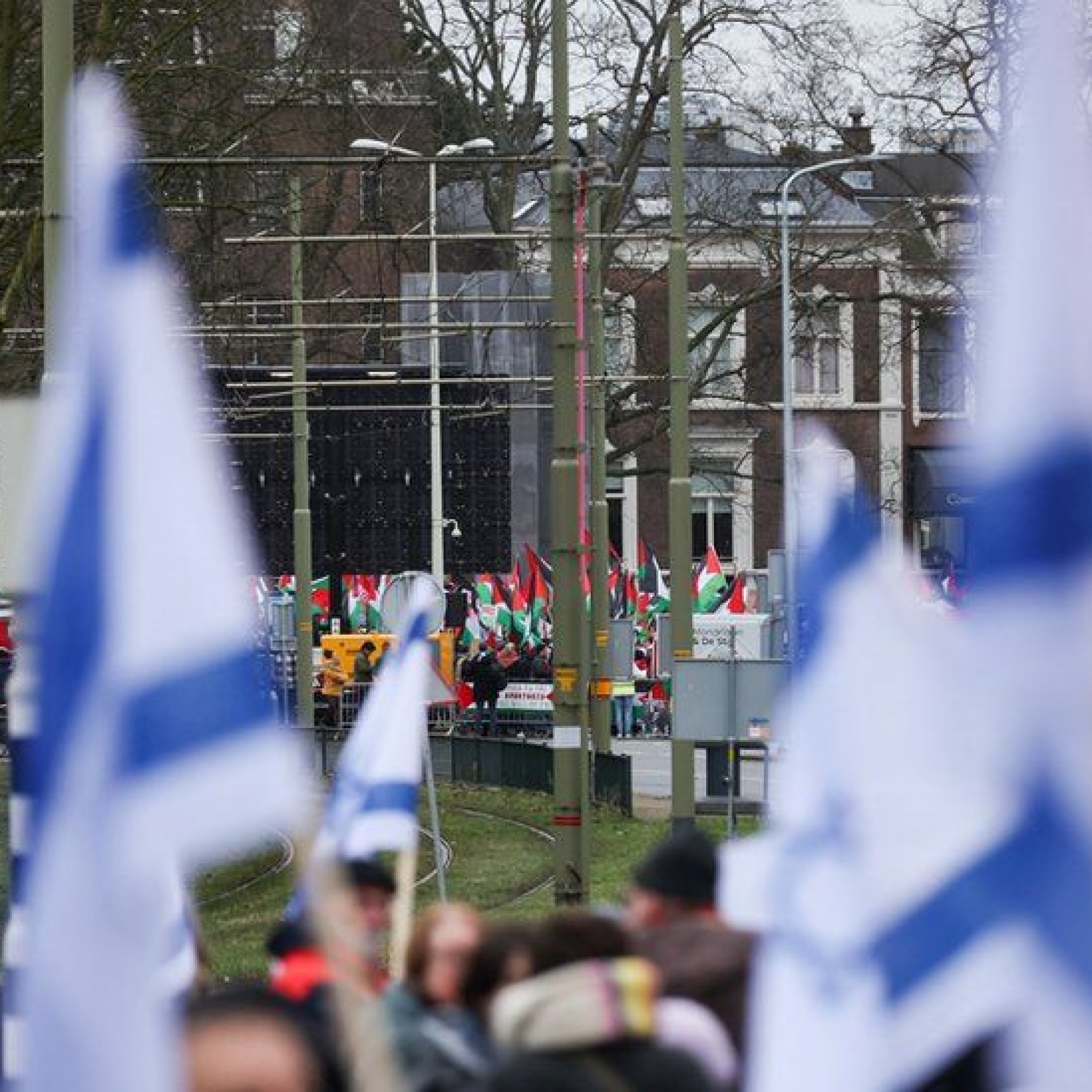 Pro-Israeli and pro-Palestinian protesters gathered near the ICJ in the Hague to watch the proceedings