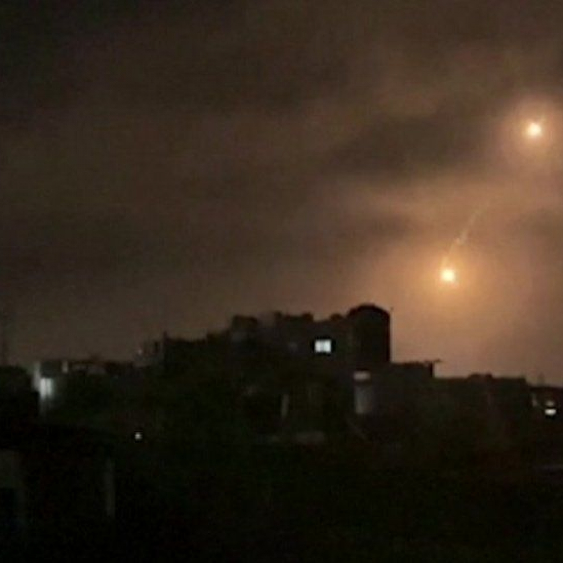 Flares over the Gazan city of Rafah at night
