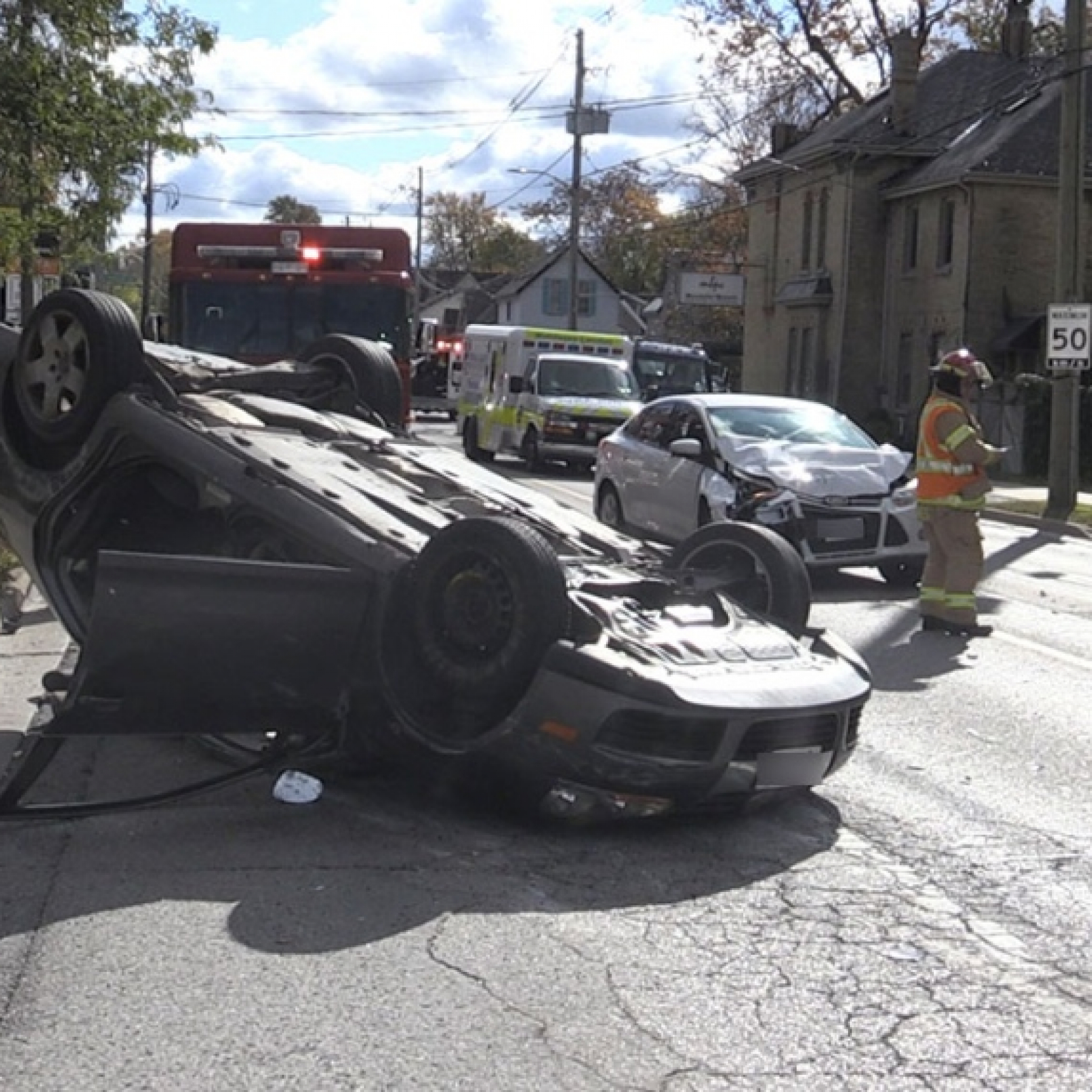 Vehicle slides half-a-block on its roof after early afternoon collision