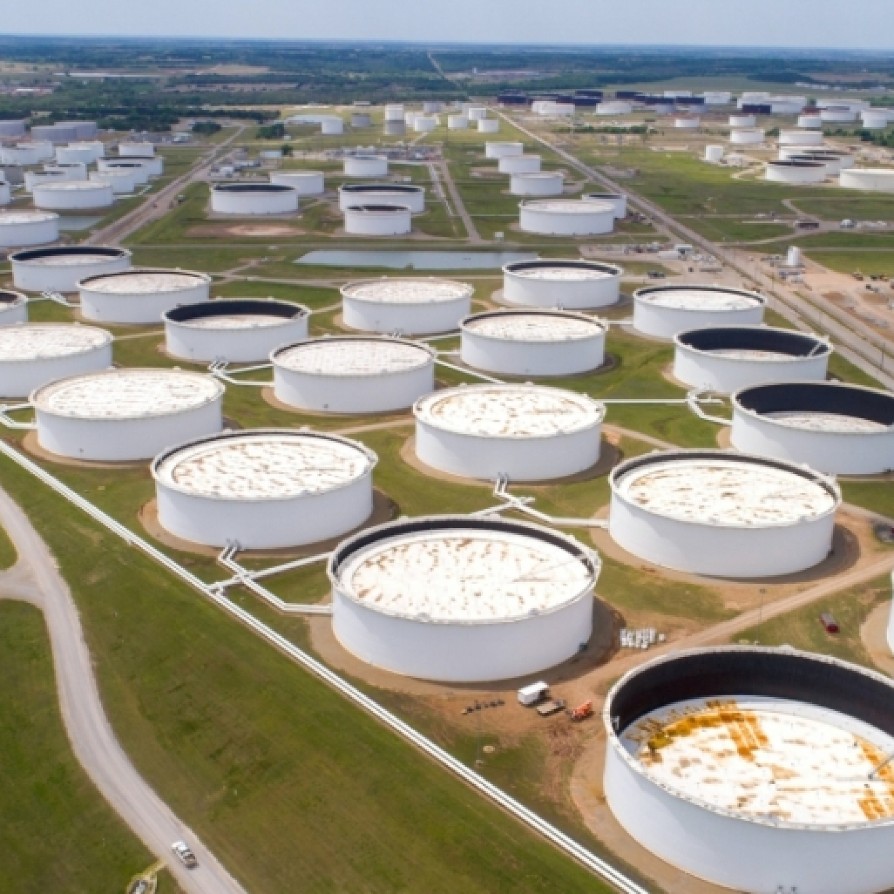 Oil retreats from multi-year highs after US stock build
