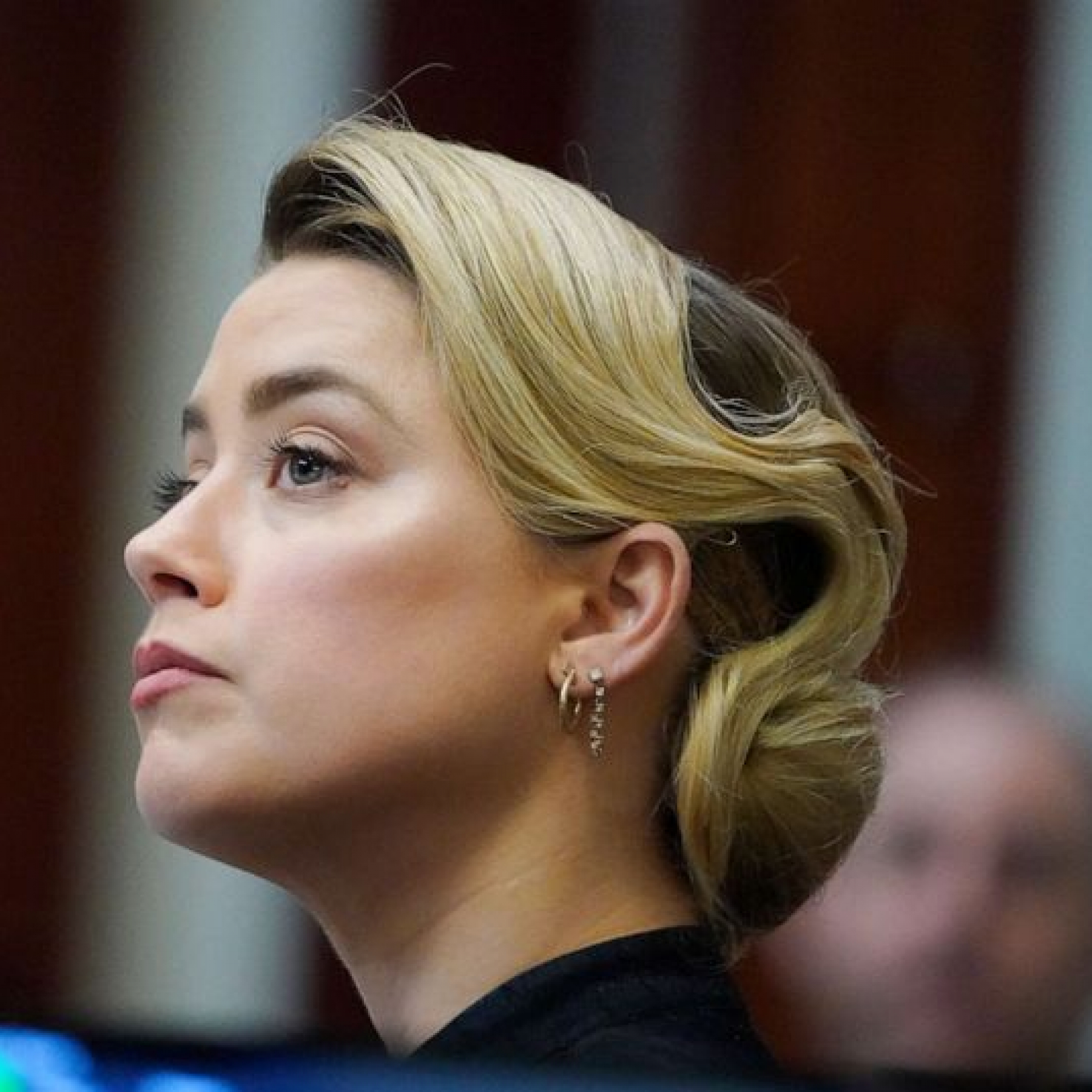 Amber Heard denies striking Johnny Depp and doctoring photos