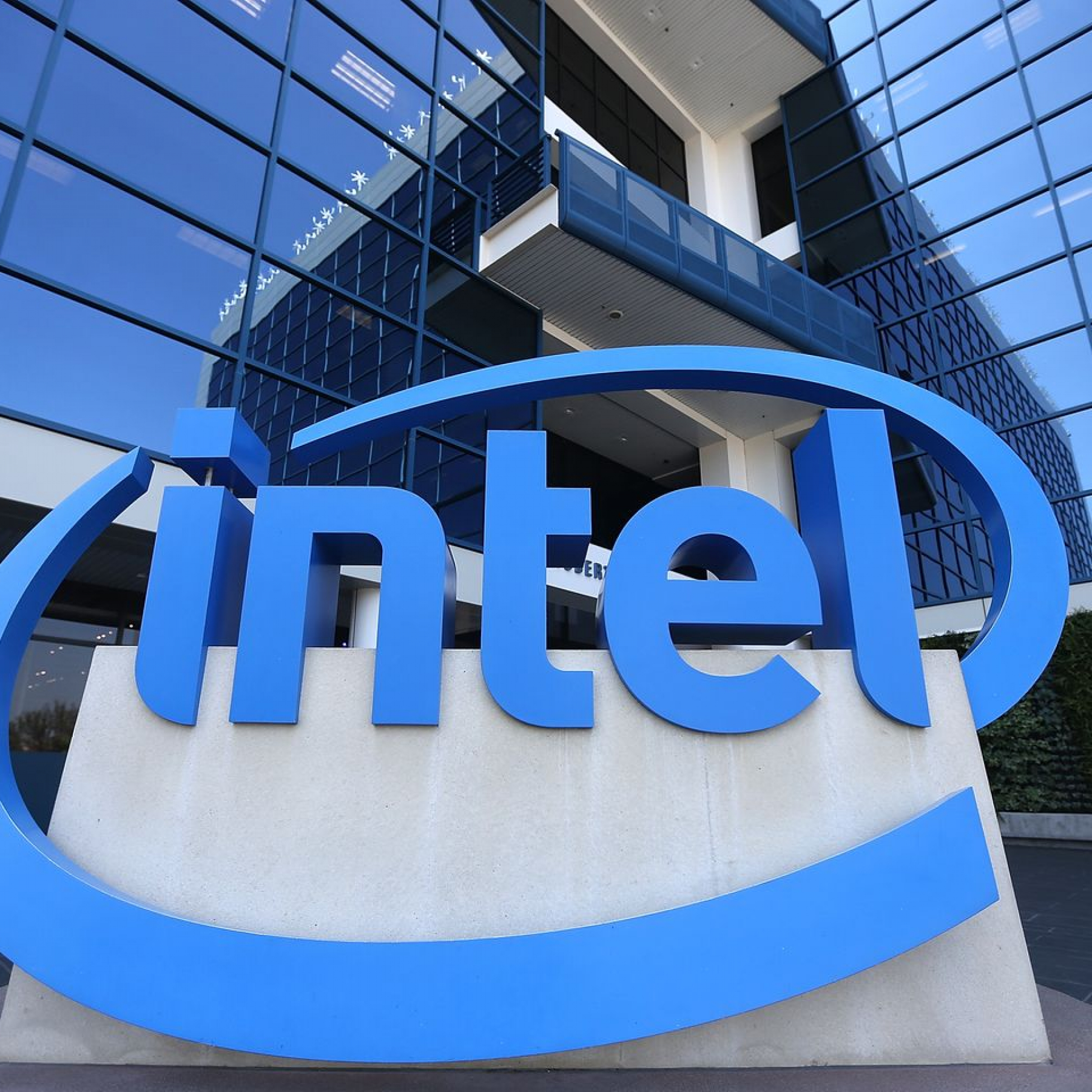 Intel earnings drop revenue edges higher