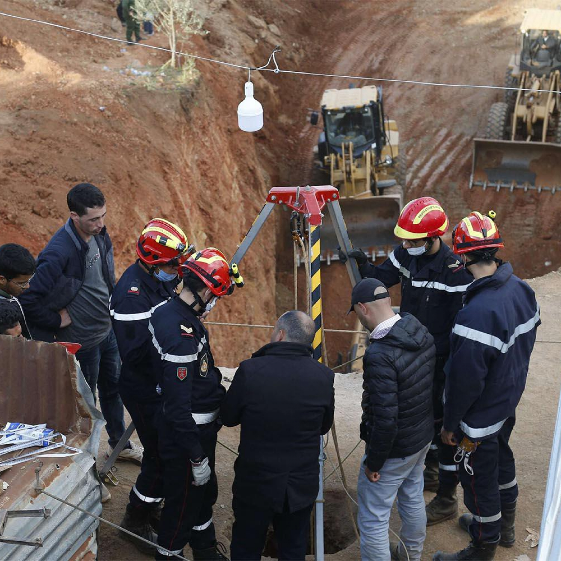 Moroccan rescuers dig to save boy stuck down well for 2 days