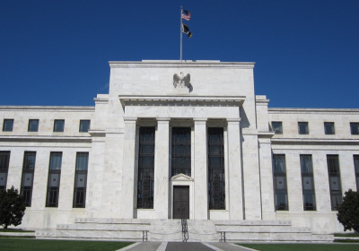 WRAPUP 1-Fed heads for the exits despite Omicron. Who will follow