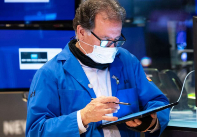 Stock futures tumble after volatile session