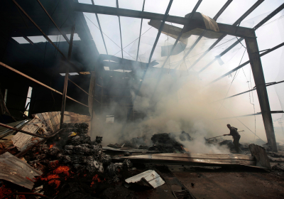 Saudi-led coalition strike on Yemens Sanaa kills 14