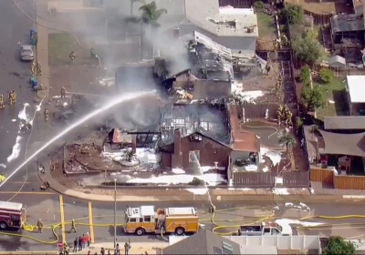 Two dead after plane crashes into homes near San Diego