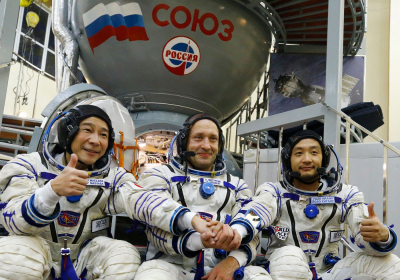 Japanese space tourists safely return to Earth