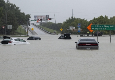 Heavy rain floods streets across the Dallas-Fort Worth area