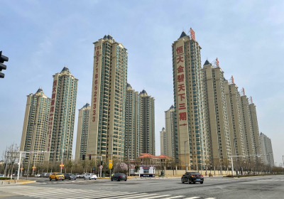 Evergrande default signals volatility but no crash analysts say