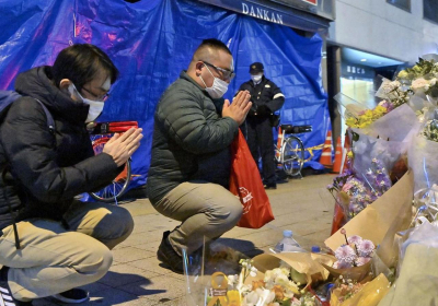 Japans emperor prays for pandemic dead in New Year message