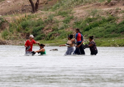 migrant crossing the Rio Bravo river from Mexico last week