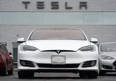 After $4 billion deal with Tesla Hertz says it will rent out half those cars to Uber drivers