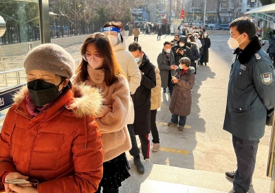 There are long queues at offices issuing passports and permits to travel to Hong Kong