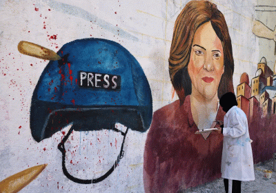 Family of journalist killed in West Bank lashes out at Biden