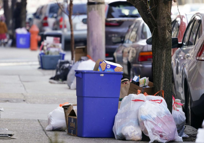 Garbage and recyclables pile up as omicron takes its toll
