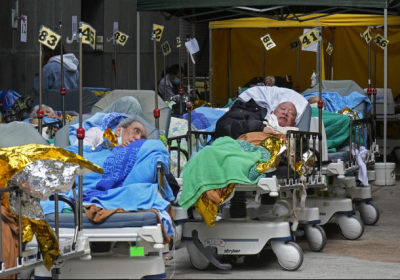 Hong Kong hospitals hit 90