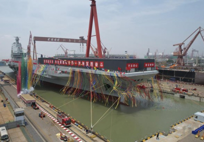 China launches high-tech aircraft carrier in naval milestone