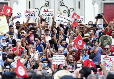 Thousands take to streets against Tunisian president