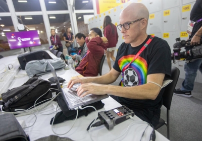 Grant Wahl at work in Qatar last month