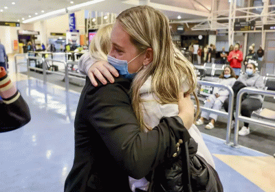 Tears and chocolate as New Zealand opens its borders to 60 more countries
