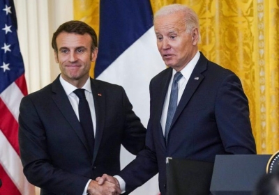 US President Joe Biden and French President Emmanuel Macron shake