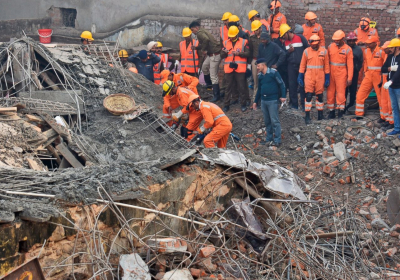53 dead in China building collaps search for trapped ends as rescuers find 10 survivors