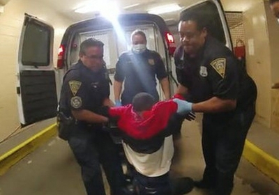  Officers charged after black man paralysed in van