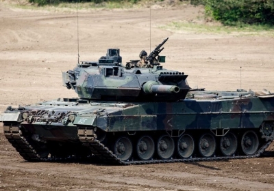 German Chancellor Olaf Scholz - pictured last year - was under international pressure to send Leopard 2s