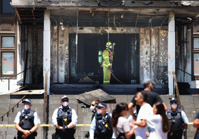 Fire damages front doors of Australias Old Parliament House