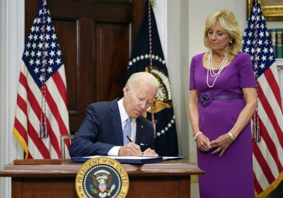 Biden celebrates passage of gun law at White House