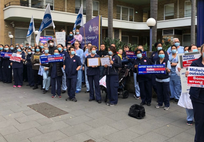 Thousands of Australian nurses go on strike as Covid cases mount