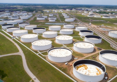 Oil retreats from multi-year highs after US stock build