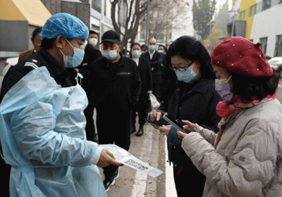 North Korea orders strict lockdown with first official Covid cases