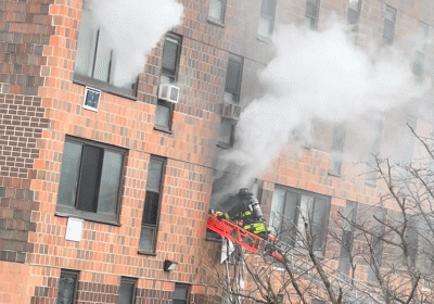 New York fire: At least 19 killed in apartment block blaze
