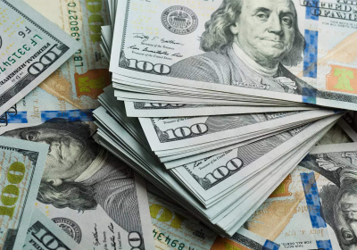 Dollar edges up after pullback amid caution as finance ministers meet